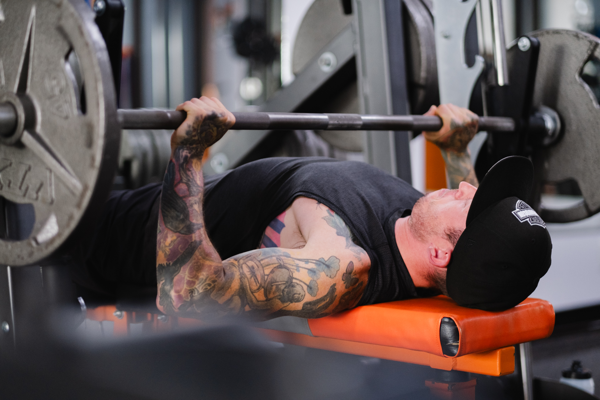 Adult member training on a stable strength machine at Brickhouse Gym in Regina