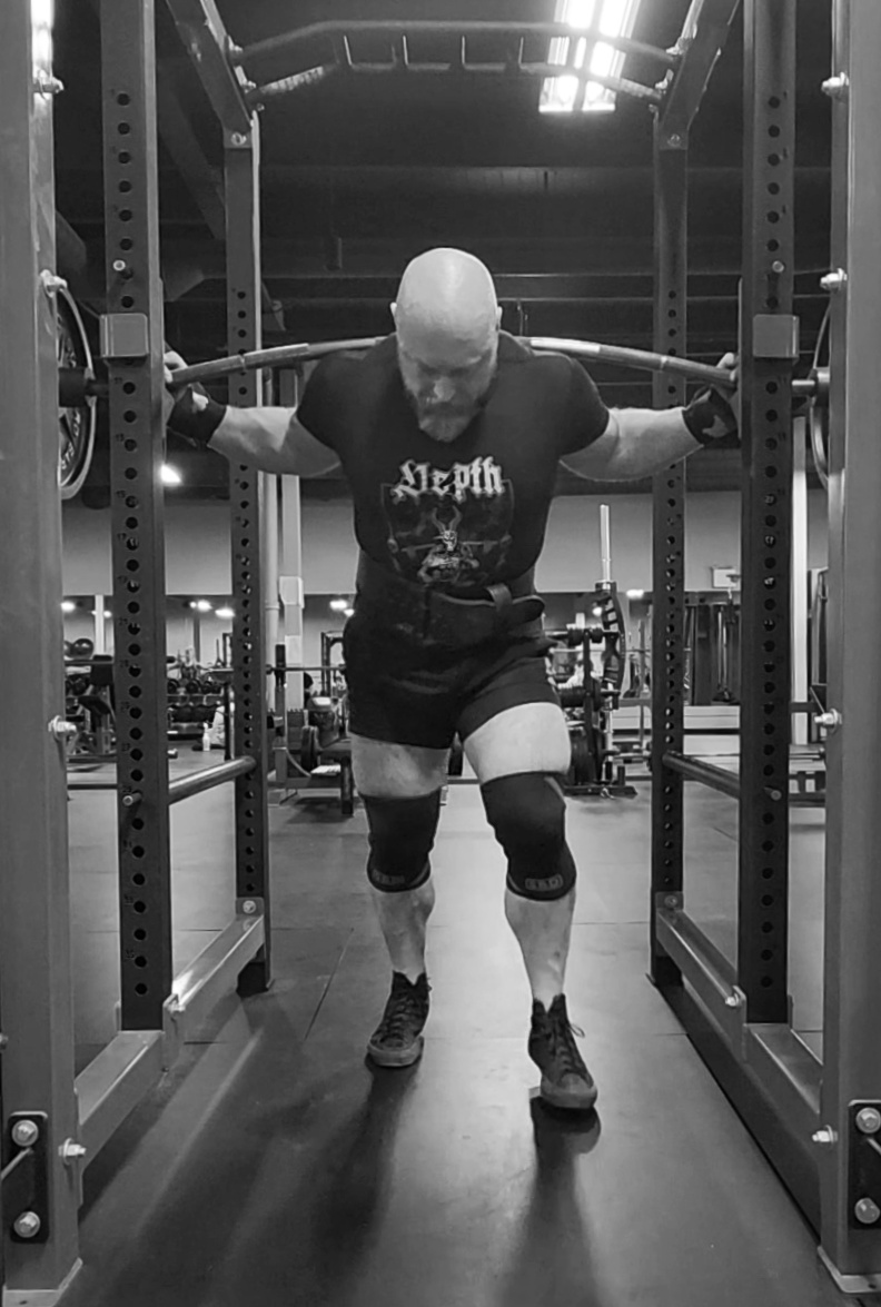 Dana Molander performing a heavy barbell lift